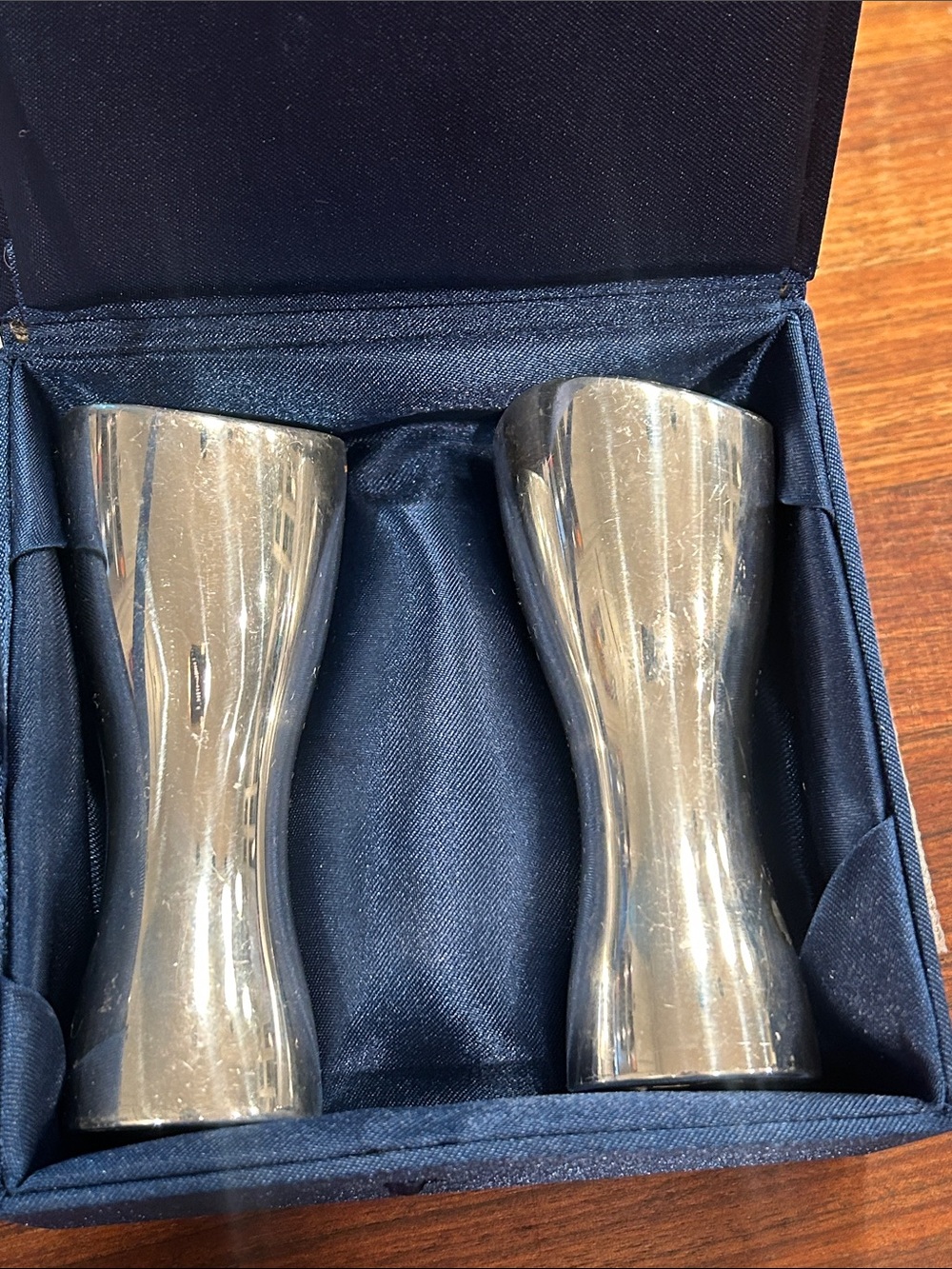 Nambe Polished Silver Stainless Steel Curved Salt and Pepper Shaker Pair